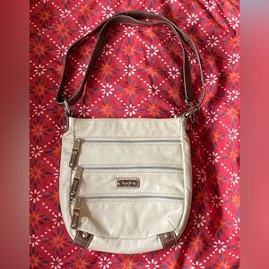 Vintage Tignanello genuine leather bucket bag, cream w/brown trim,roomy